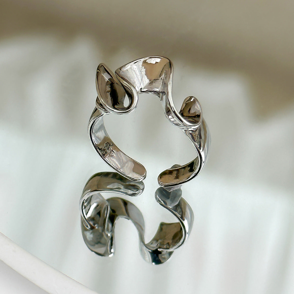 Liquid Lava Curved Ring Female Pleated Glossy